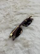 Cartier Zonnebril Bruine Glazen, Goude Houten Montuur