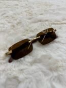 Cartier Zonnebril Bruine Glazen, Goude Houten Montuur