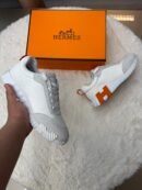 Hermes Bouncing White Orange Logo